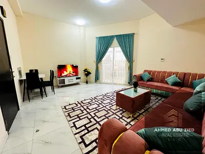 Two rooms and a living area, fully new furnishings, a finished bathroom, a balcony, and central air conditioning; prime location close to amenities.