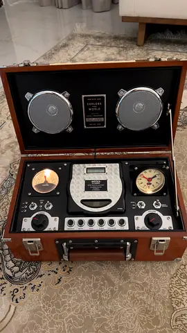 Vintage-style portable audio system in wooden suitcase with speakers
