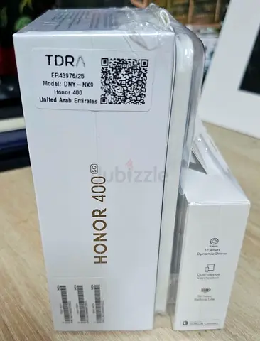 Unwanted gift .. Brand new Honor 400 phone with cover and Bluetooth earphones. 1200 AED!