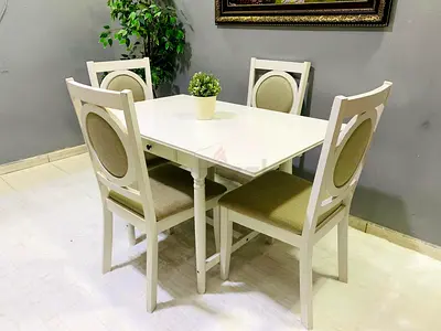 White Extendable Dining Table with 4 Upholstered Chairs - Good Condition