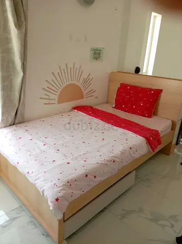 Single wooden bed with storage drawer - light oak finish