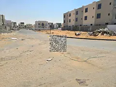 Residential/investment land for sale—suitable for villas or townhouses—in the Al Zahia area of