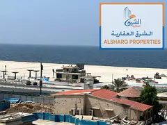 A beautiful 2-bedroom apartment with a living room and full sea view. Features include 2 bathrooms a