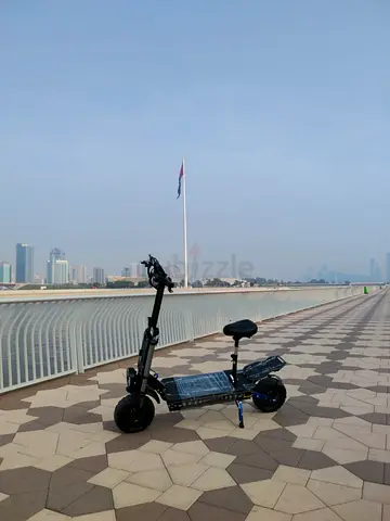 Electric Scooter with Seat — Off-road Tires, Foldable Handlebars