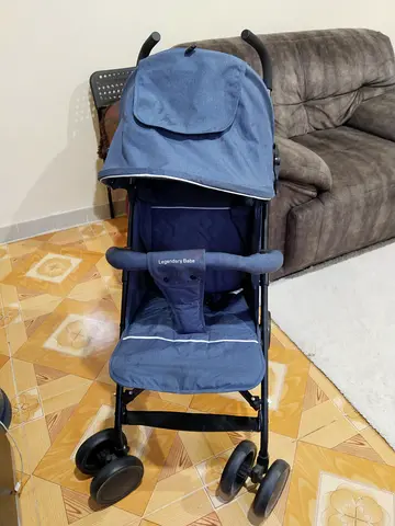 Lightweight Blue Baby Stroller - Compact, Good Condition.