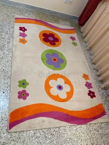 Light cream floral children's rug - good condition, 230x150cm