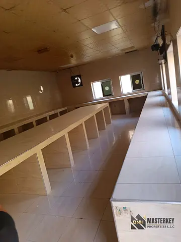 36 ROOMS WELL MAINTAINED WITH 10/12 PEOPLE CAPACITY READY TO MOVE AL SAJAA SHARJAH