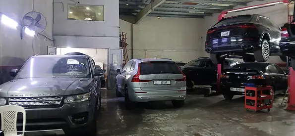 Auto workshop with vehicle lifts and equipment - garage for sale/lease