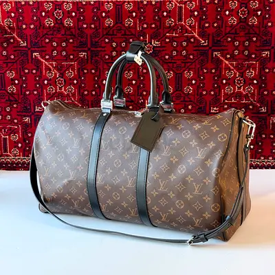 Luxurious Louis Vuitton  Duffel Bag - A Must-Have!