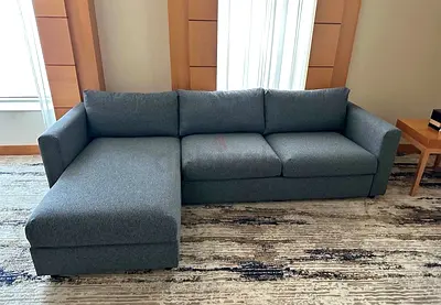 Grey L-shaped Sofa bed with mattress Chaise - Good Condition