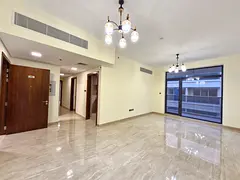 LIKE A BRAND NEW SPACIUS 2 BEDROOM WITH CLOSED KITCHEN HAVING GYM,SWIMMING POOL AND COVERD PARKING
