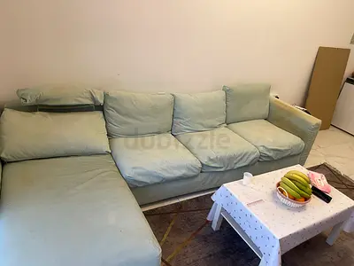 Light green L-shaped fabric sofa with chaise - good used condition