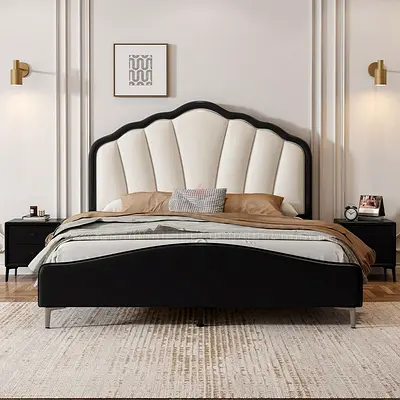 Queen upholstered bed frame with scalloped headboard and leather finish
