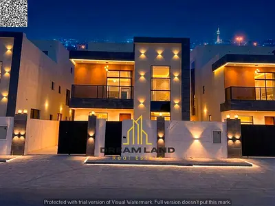 5-Bedroom Villa for Sale in Al Helio, Ajman Villa for Sale in Al Helio The kitchen is equipped with essential appliances and connects directly to th 5