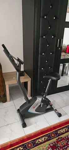 Used upright exercise bike - compact home cardio trainer