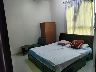 Furnished family room with attached bathroom