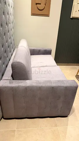 Brand new grey 2-seater fabric sofa-bed