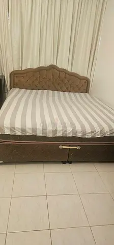 Queen size upholstered bed with mattress — good condition