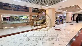Start Your Business in a Prime Al Majaz 3 Location | Commercial Shop in a Mixed-Use Tower