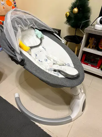Baby Swing/Bouncer in Grey - Good Condition, bluetooth option for music, 5 stages of movements