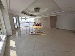 For Rent in Al Khan, Sharjah, a spacious and elegant three-bedroom apartment with a living room, des