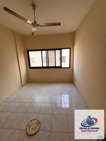 Cheapest 2BR+hall, exceptional location in heart of Al Butina Sharjah. Experience luxury living at the lowest price point.