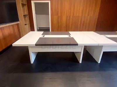 White modular conference table with dark inlay — good condition