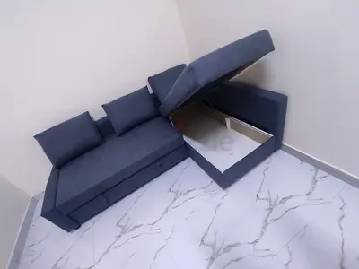 Ikea L Shape Sofa cum bed with big storage in L