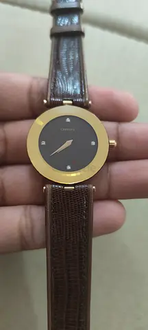 Authentic Swiss Century Sapphire & 18K Gold Dress Watch (Diamond Markers)