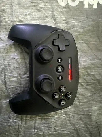 Portable black wireless game controller - good working condition