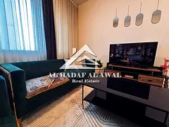 One-bedroom apartment with a living room in Hamid Tower next to Ariana Hotel, with a kids' pool, 420