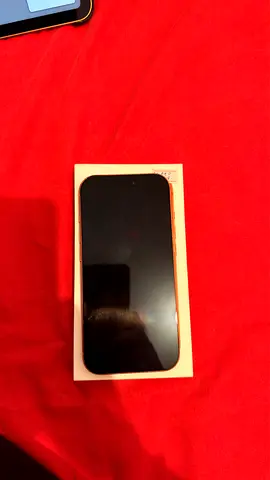 iPhone with box - charger cable included.