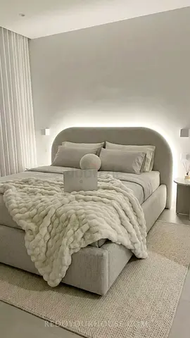 Beige upholstered bed with rounded headboard (queen/double)