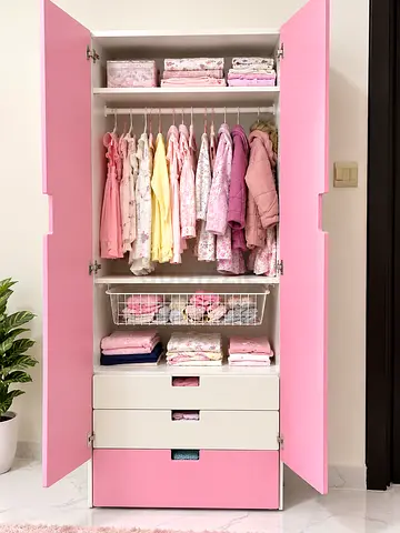 Pink baby wardrobe / closet with shelves and drawers - good condition