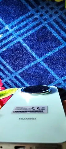 Huawei smartphone (good working condition) with charger ring