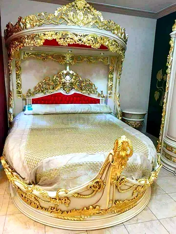 Ornate Gold Canopy Round King-Size Bed with Carved Details