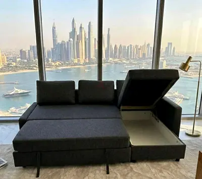 Dark grey L-shaped storage sofa bed – convertible with chaise