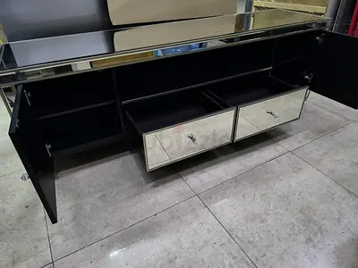 Black mirrored wide sideboard cabinet with drawers and doors