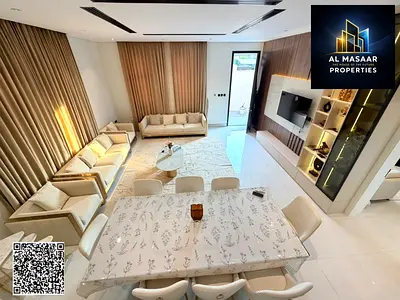 Includes water, electricity, central air conditioning, and furniture; located in one of Ajman's mos