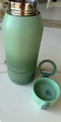 Momcozy portable milk warmer for both breastmilk and formula