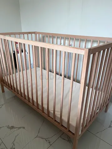 Solid Wooden Baby Crib - Natural Finish, Excellent Condition.