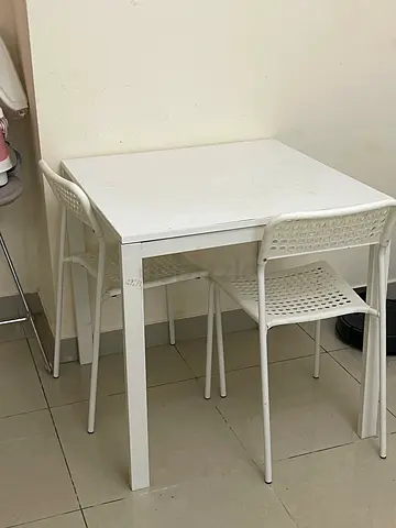 IKEA Simple white dining table with 2 matching chairs - good condition