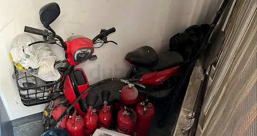 Red electric scooter / moped - used, runs OK