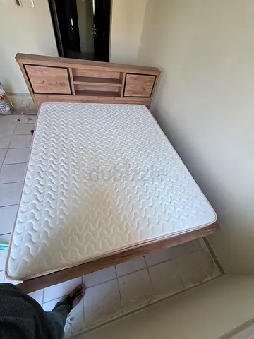 Wooden single bed frame with mattress and storage headboard - good condition. 190 x 200 cms