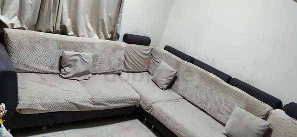 Used L-shaped Sofa Corner Set - Comfortable 7-seater, neutral covers