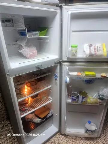 Used double-door refrigerator/freezer — working condition, selling now