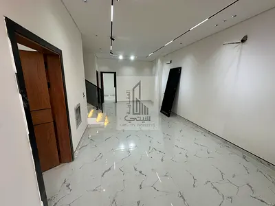 Modern, move-in ready 5-bedroom townhouse.