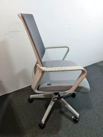 Modern ergonomic office chair with mesh back and adjustable tilt