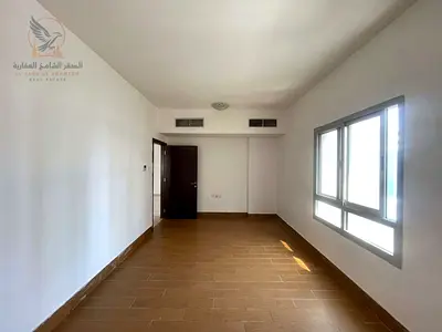 Two-bedroom apartment with a living room for annual rent in Ajman, Al Rashidiya 1 area, next to Al