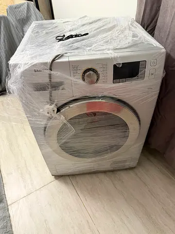 Front Load dryer- Almost New, Wrapped for Transport